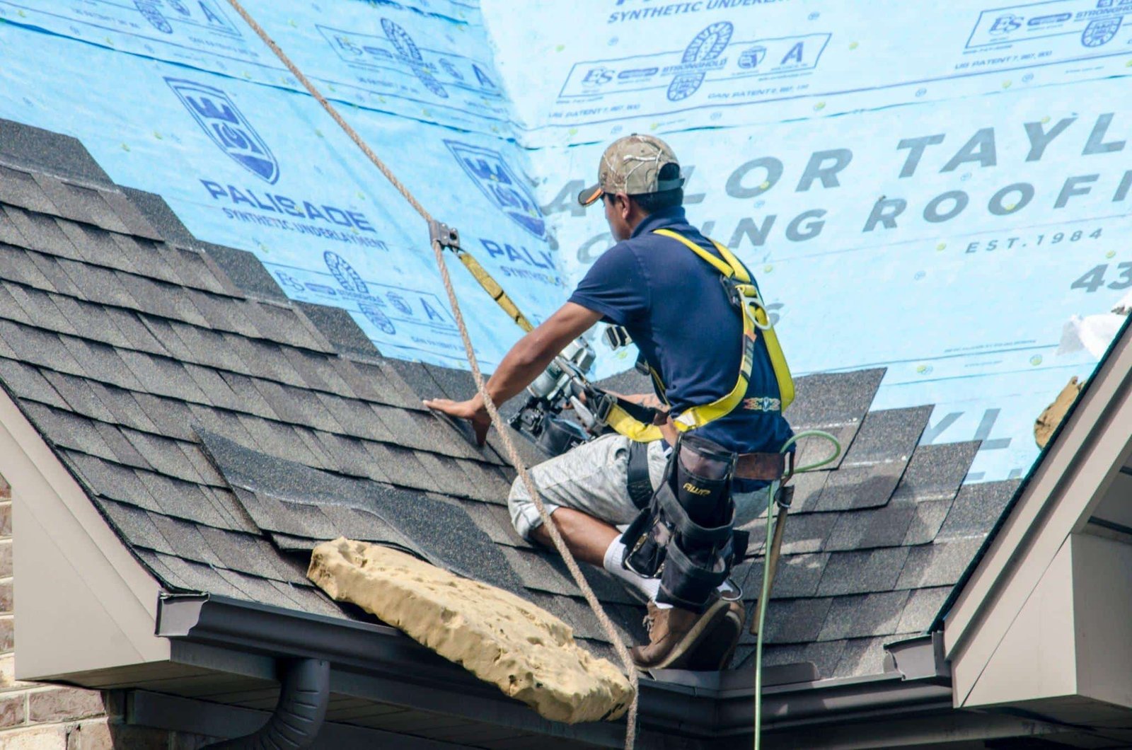 Roofing Contractors Replacing Damaged Roofs After a Hail Storm2